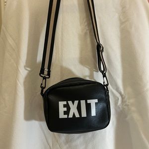 Black “EXIT” crossbody bag